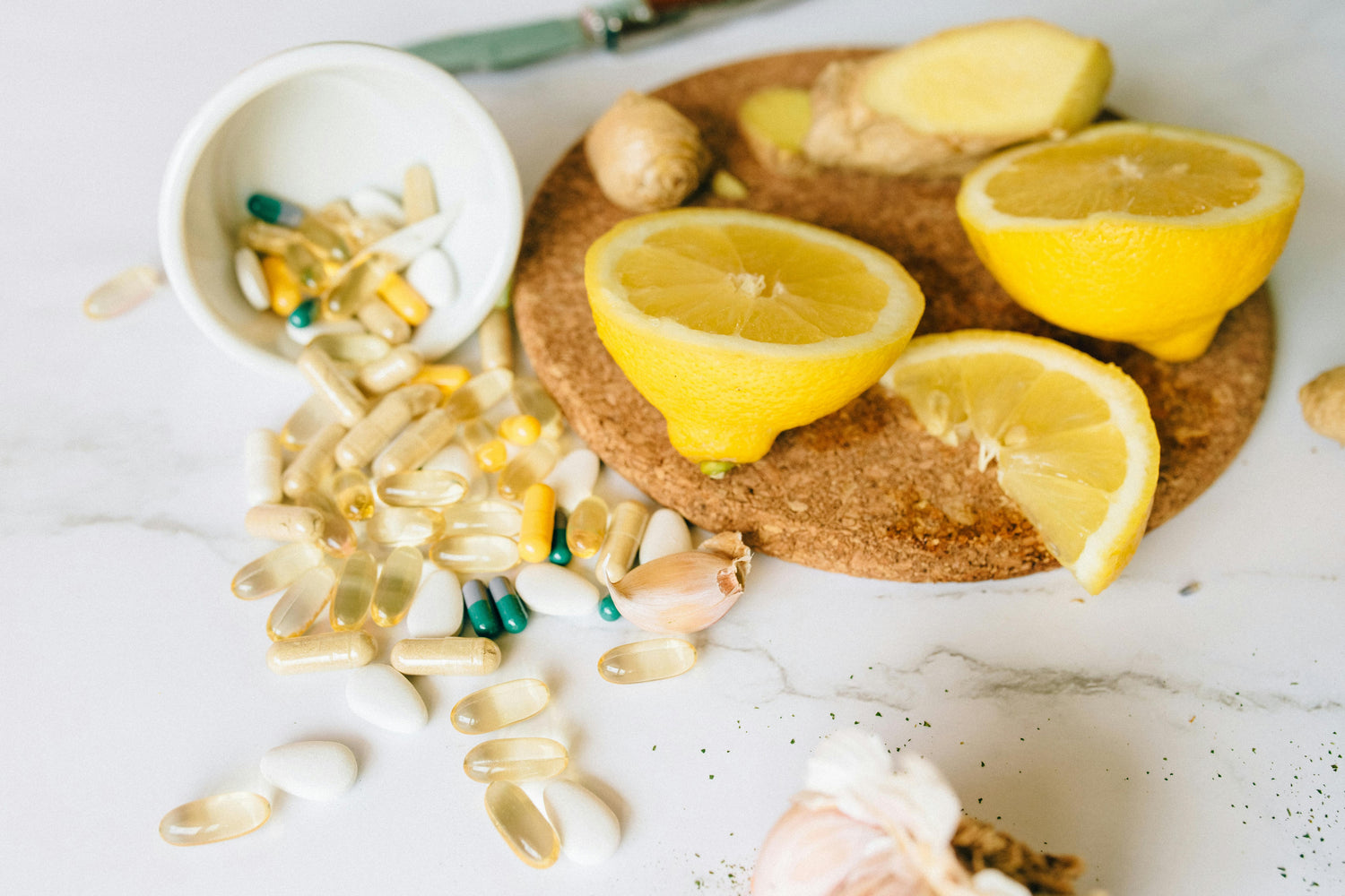 Buy immunity support supplements in Kenya. Immune boosters with vitamins, herbs & antioxidants. Fast delivery across Kenya. Photo by Nataliya Vaitkevich: https://www.pexels.com/photo/capsules-and-tablets-and-sliced-lemon-on-a-corkboard-7615478/